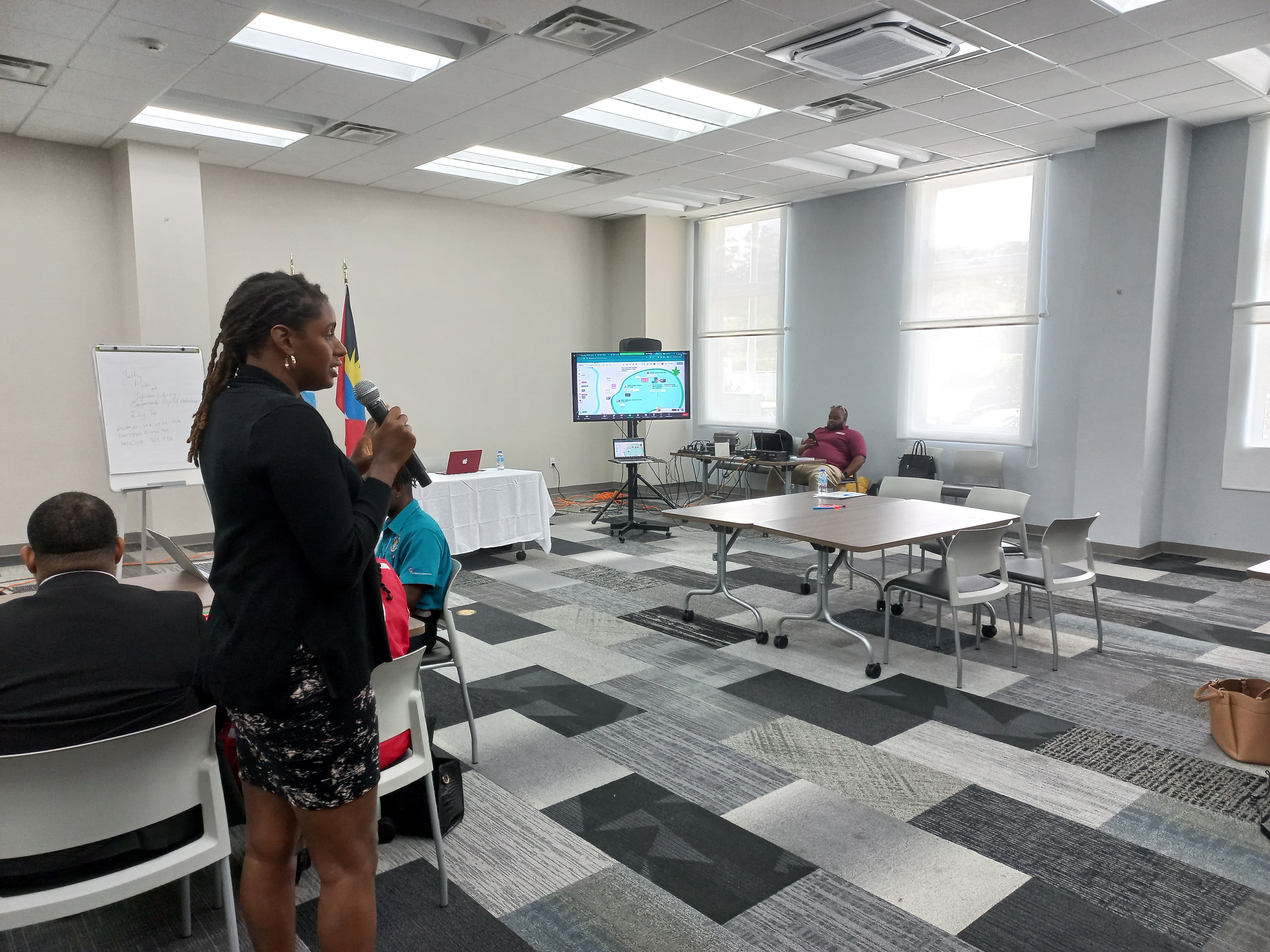 Ms. Christal Clashing-Oreilly, facilitator engages the youth organizations present on how to create digital flyers and engage one another via Miro white board.