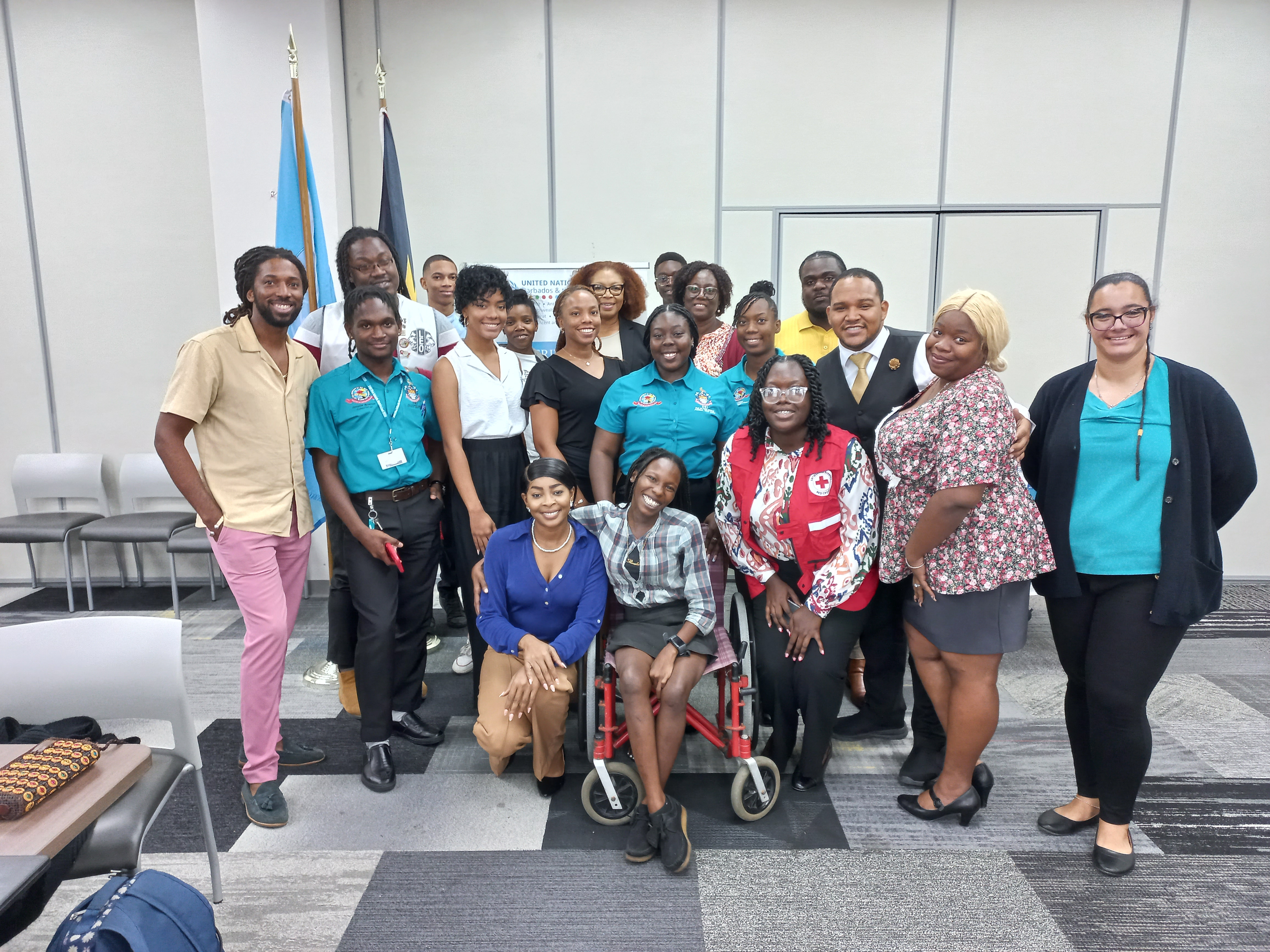 Phase Two  - A group photo of the in-person youth organization participants at the end of the Hybrid Workshop.